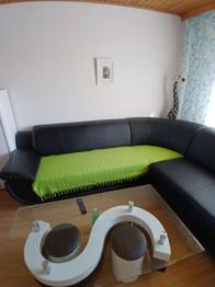 Wohnzimmerbank Schenkelmass 2,50x2,50, leichte Schäden auf der Sitzfläche