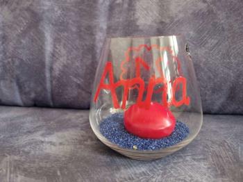 Dekoratives Glas mit Kerze