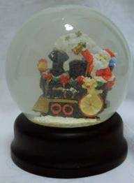 Schneekugel Weihnachtsmann und Lokomotive 12 cm hoch