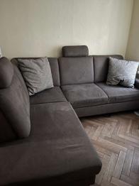 Graue gemütliche Couch zu verschenken