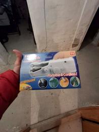 Handy Stitch, die tragbare Hand-Nähmaschine.