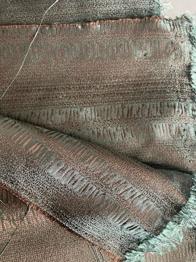 Stoff grünlich schimmernd